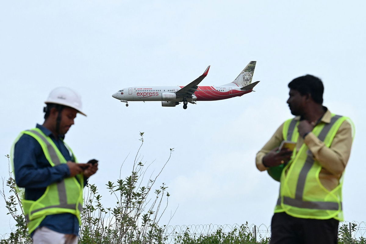 <i>Idrees Mohammed/AFP/Getty Images via CNN Newsource</i><br/>An Air India Express aircraft prepares to land at Kempegowda International Airport in Bengaluru on September 4