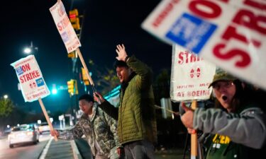 Boeing employees work the picket line in Renton