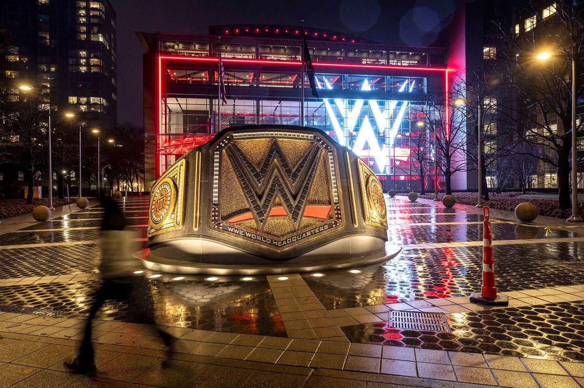 <i>John Moore/Getty Images via CNN Newsource</i><br/>A WWE logo shines from the WWE wrestling world headquarters on January 28