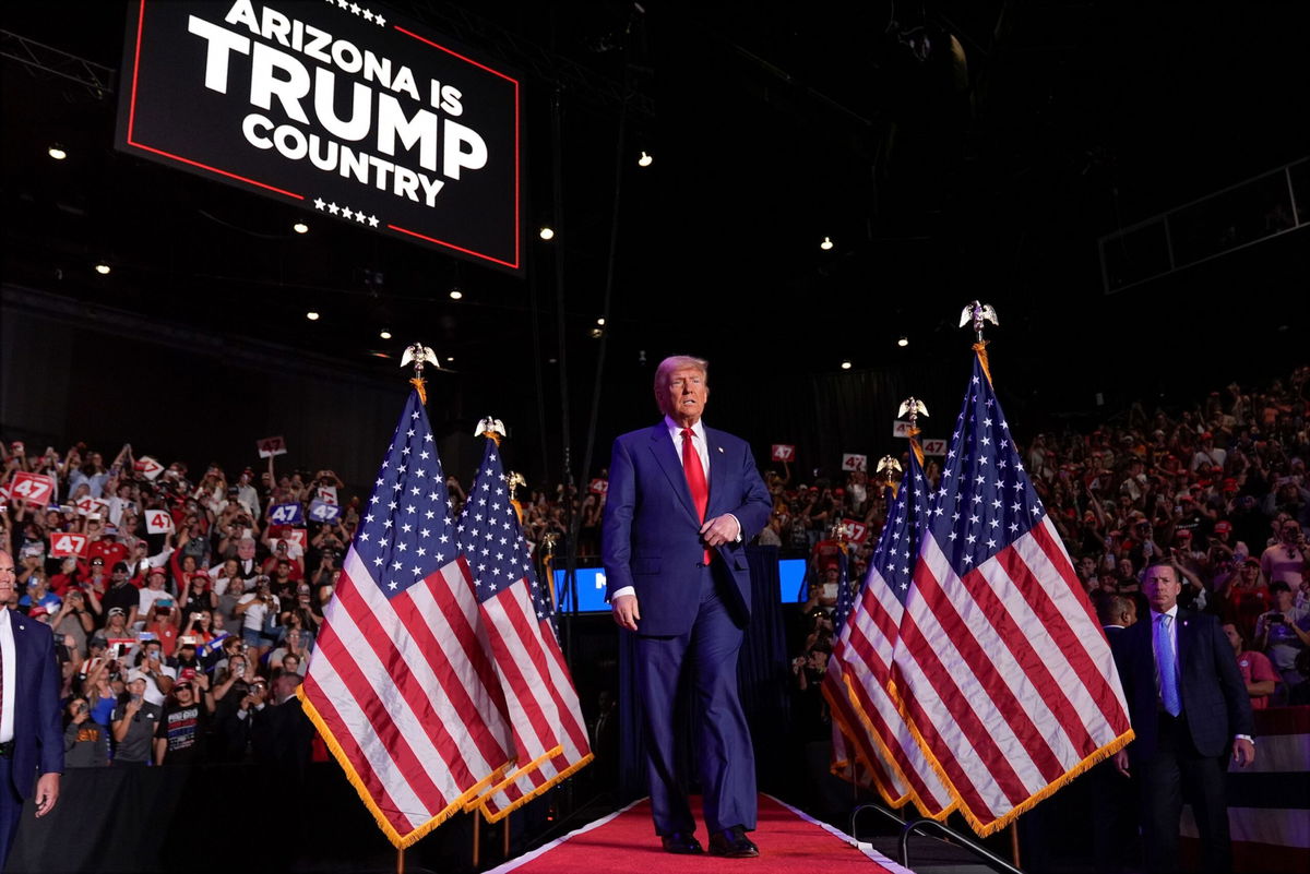 <i>Alex Brandon/AP via CNN Newsource</i><br/>Republican presidential nominee and former President Donald Trump arrives at a campaign rally in Tempe