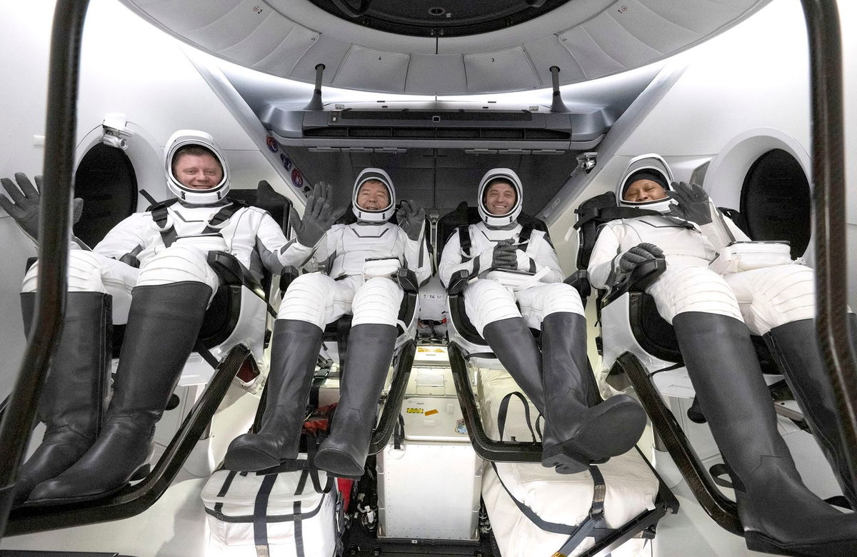 <i>Joel Kowsky/NASA/Getty Images via CNN Newsource</i><br/>The SpaceX Crew-8 astronauts are seen inside the SpaceX Dragon Endeavour spacecraft onboard the SpaceX recovery ship MEGAN shortly after having landed in the Gulf of Mexico off the coast of Pensacola