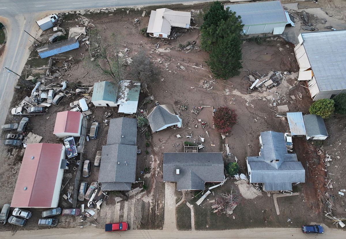 <i>Mario Tama/Getty Images via CNN Newsource</i><br/>Flood-damaged homes are seen October 4 in Swannanoa