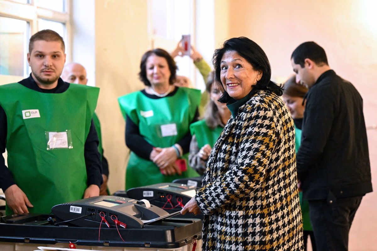 <i>Vano Shlamov/AFP/Getty Images via CNN Newsource</i><br/>Georgian President Salome Zourabichvili votes at a polling station in Tbilisi on Saturday. Zourabichvili has condemned “deeply troubling incidents of violence unfolding at various polling stations” as the country votes in a crucial parliamentary election.