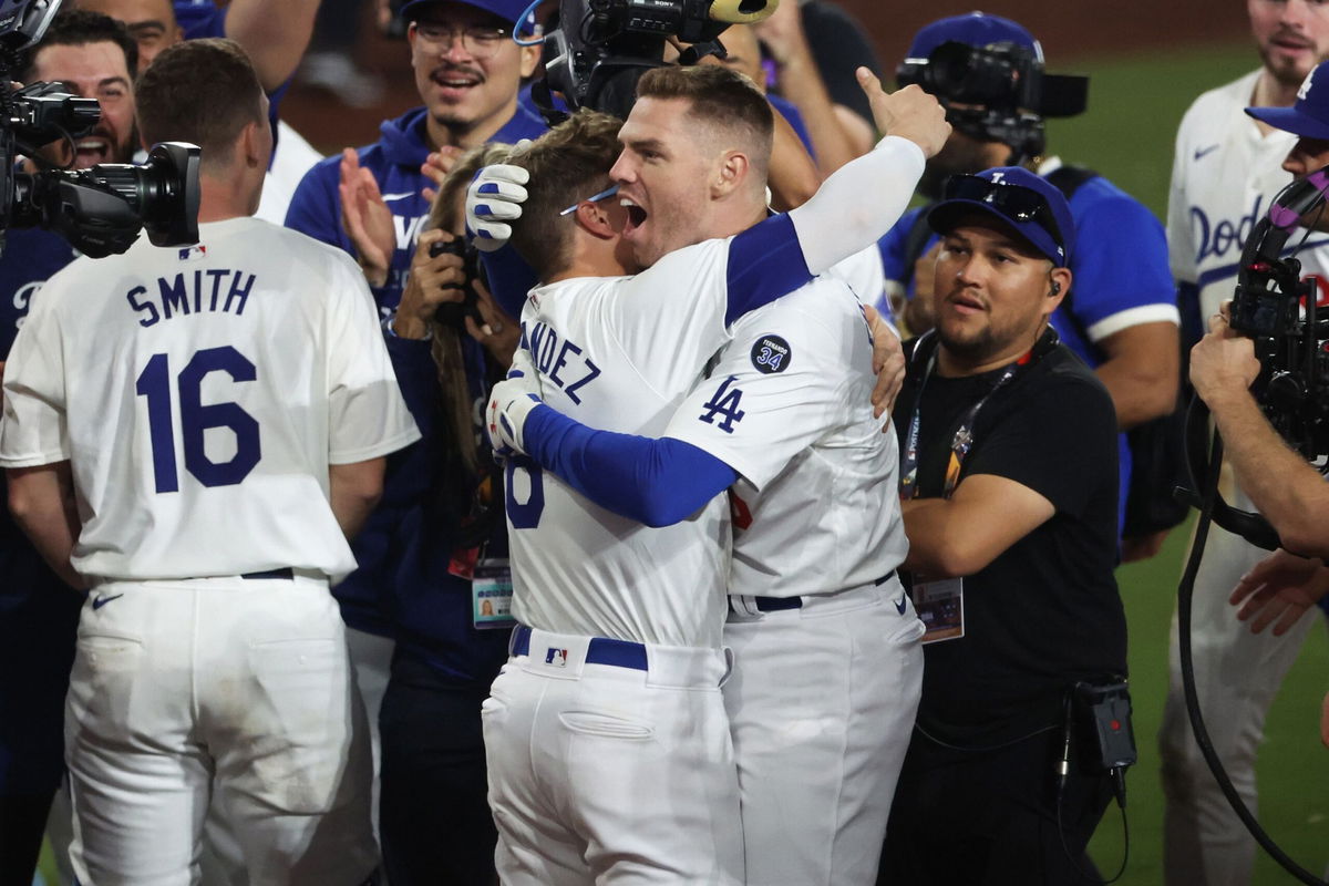 <i>Steph Chambers/Getty Images via CNN Newsource</i><br/>Freddie Freeman (right) provided the decisive moment as the Los Angeles Dodgers won Game 1 of the World Series.