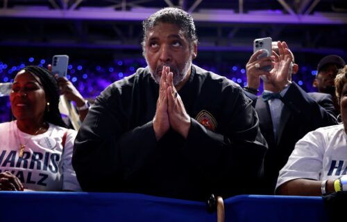 The Rev. William J. Barber II listens to Harris speak at a campaign rally in Greenville