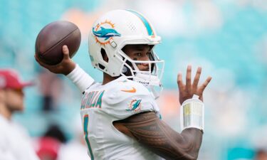 Miami Dolphins quarterback Tua Tagovailoa warming up before game against the Arizona Cardinals.