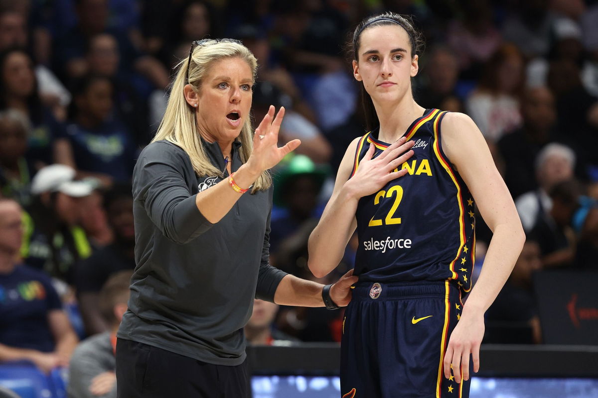 <i>Gregory Shamus/Getty Images via CNN Newsource</i><br/>Indiana Fever guard Caitlin Clark talking to head coach Christie Sides during a preseason game.