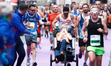 Actor Colin Farrell ran the final 4 kilometers of the Irish Life Dublin Marathon 2024 while pushing close friend Emma Fogarty.