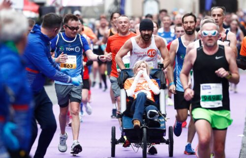 Actor Colin Farrell ran the final 4 kilometers of the Irish Life Dublin Marathon 2024 while pushing close friend Emma Fogarty.