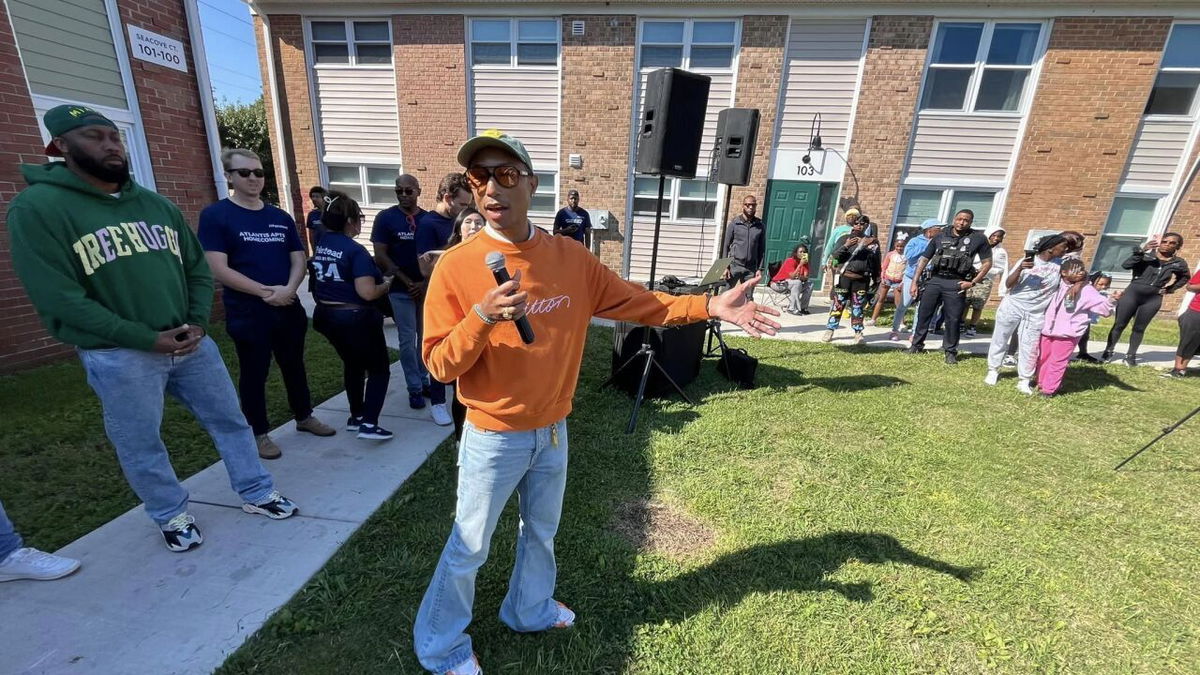 <i>WTKR via CNN Newsource</i><br/>Music Superstar Pharrell Williams speaks to a crowd at his former neighborhood in Virginia Beach