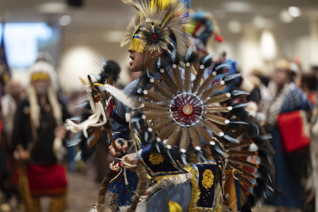 People dance during a powwow at Chinook Winds Casino Resort, Saturday, Nov. 16, 2024, in Lincoln City, 