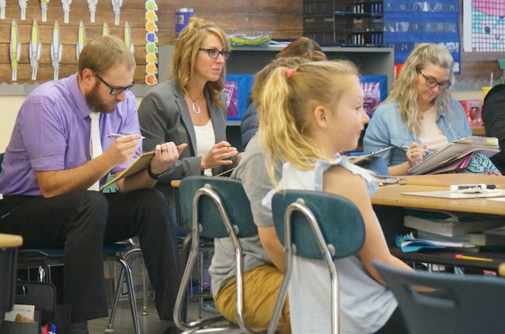 Teachers watch Eastern Oregon University professor Ronda Fritz demonstrate how to teach phonics during a third-grade reading lesson at Brooklyn Primary School in Baker City. Baker School District is expected to see its PERS costs increase about 15% in the next two years from the previous biennium.