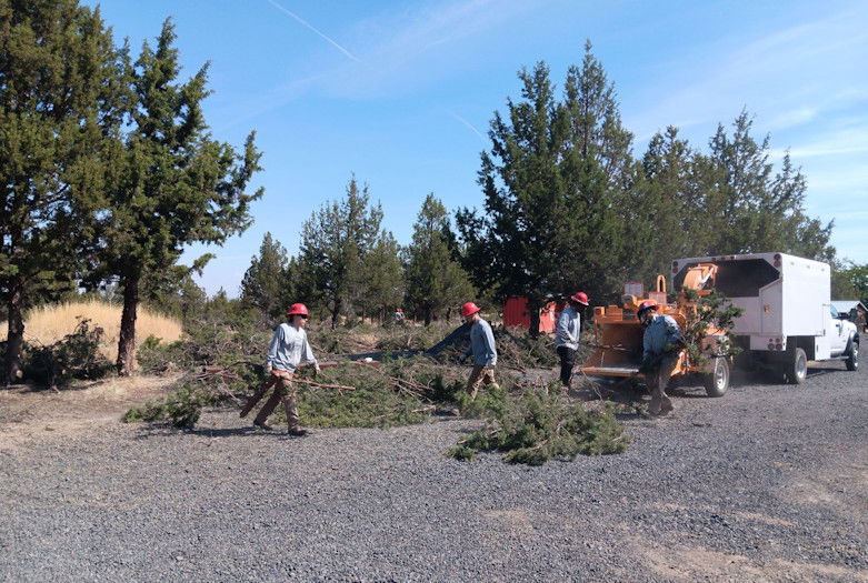 Heart of Oregon youth crews work on a fuels reduction project in Jefferson County. They helped mitigate wildfire danger in a high-risk area that's also an historic site.