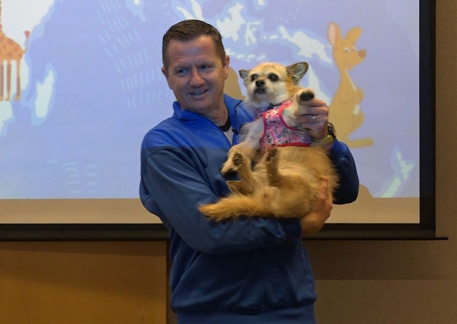 Dion Leonard and his dog Gobi, at Deschutes Public Library for 