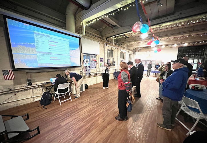 Results are shown on a big screen at the Willamette Heritage Center in Salem where Marion County Democrats held their election night watch party on Tuesday, Nov. 5, 2024.