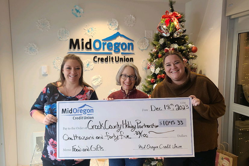 Mid Oregon Holiday Dough check presentation with Crook County Holiday Partnership