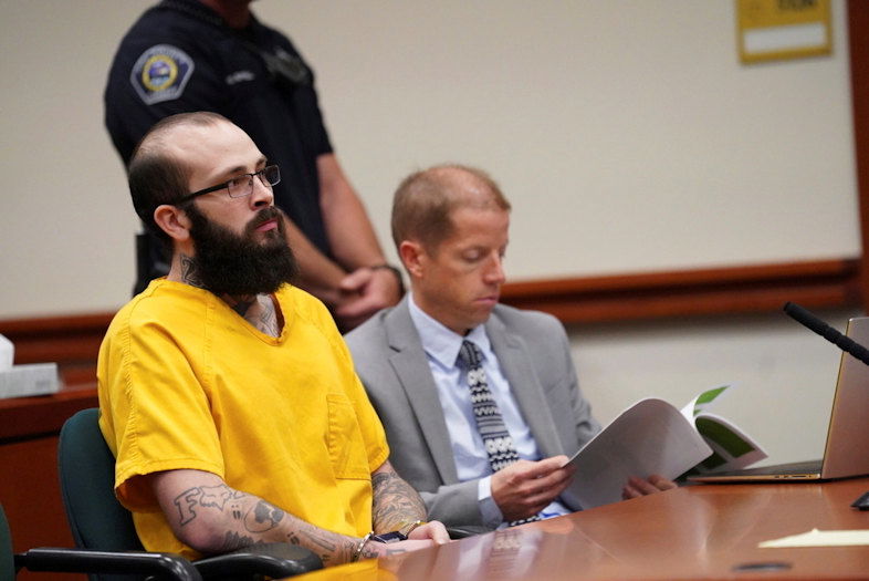 Nicholas Umphenour, 29, appears in court where he was sentenced to life in prison, Oct. 4, 2024, at the Ada County Courthouse in Boise, Idaho, for helping a fellow gang member escape by ambushing and shooting correctional officers at a Boise hospital. 