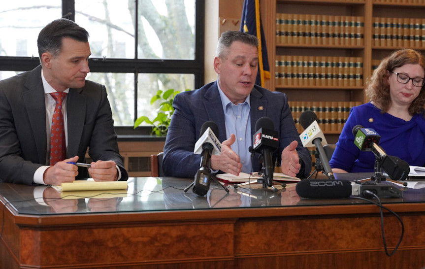 House Minority Leader Jeff Helfrich, R-Hood River, talks to reporters about the upcoming session with House Speaker Dan Rayfield, D-Corvallis, and House Majority Leader Julie Fahey, D-Eugene.