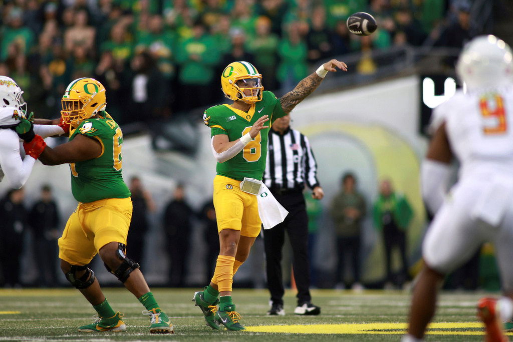 Oregon quarterback Dillon Gabriel (8) passes the ball during an NCAA college football game against Maryland, Saturday, Nov. 9, 2024, in Eugene.