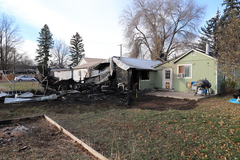 Residents, pets and chickens escaped early-morning fire in NW Prineville that burned chicken coop, storage building