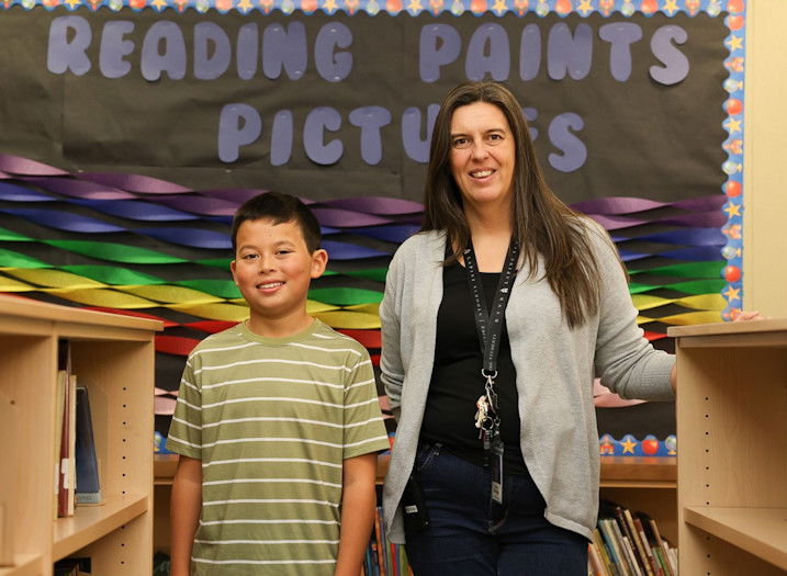 Rosland Elementary student Teegan Wright and Principal Deborah Buduan