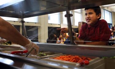 Kids like free school meals. States are trying to reel in the costs.