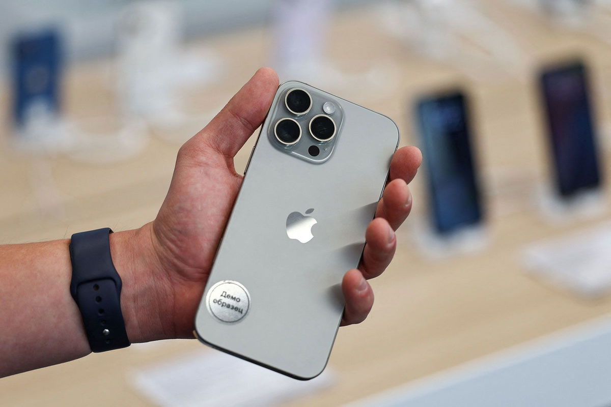 <i>Evgenia Novozhenina/Reuters via CNN Newsource</i><br/>A man holds an Apple iPhone 16 Pro Max ahead of the launch of sales of the new iPhone 16 series smartphones in a store in Moscow