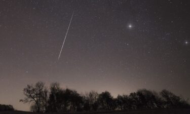 A meteor from one of the Taurid meteor showers streaks across the night sky over Slovenia's Brkini region in November 2015.