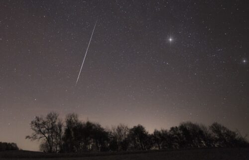 A meteor from one of the Taurid meteor showers streaks across the night sky over Slovenia's Brkini region in November 2015.