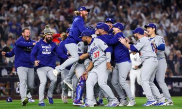 The Los Angeles Dodgers celebrate after they defeated the New York Yankees 7-6 in Game 5 to win the 2024 World Series at Yankee Stadium.