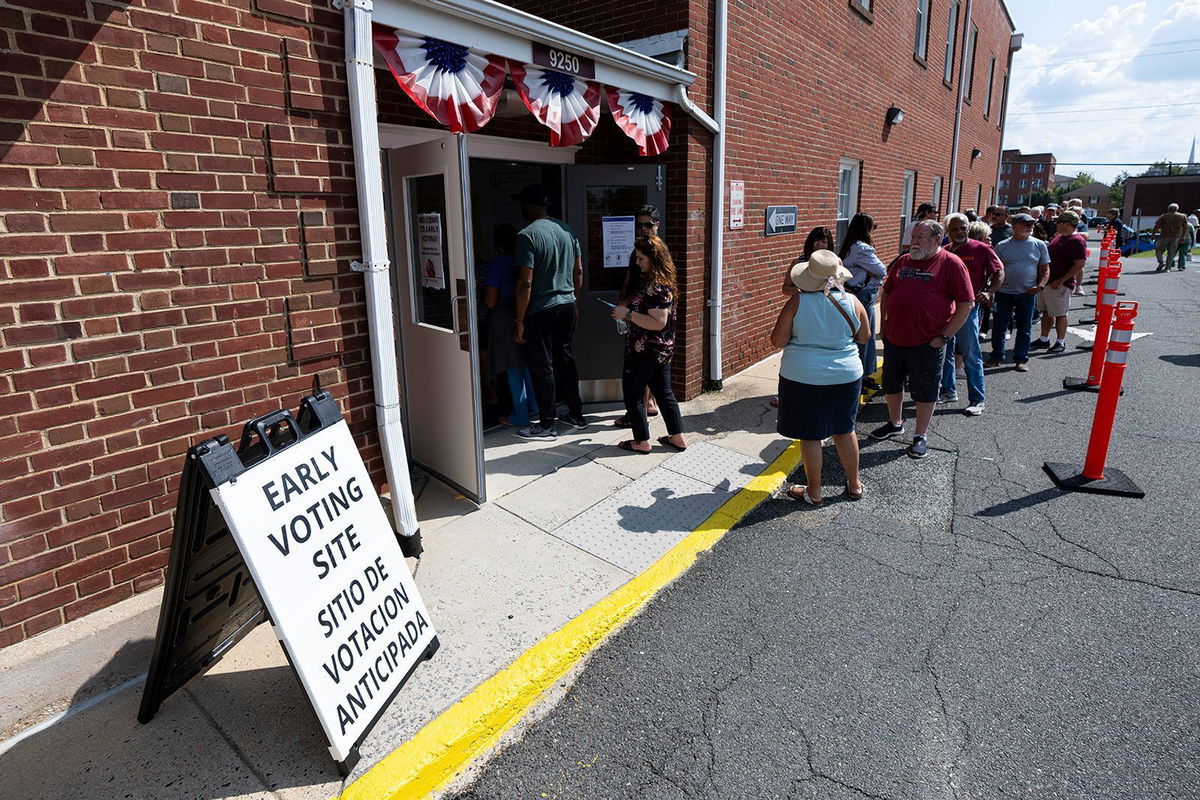 <i>Bill Clark/CQ Roll Call/AP via CNN Newsource</i><br/>Voters stand in line to cast their ballots on the first day of early voting in Virginia at the Prince William County Office of Elections in Manassas