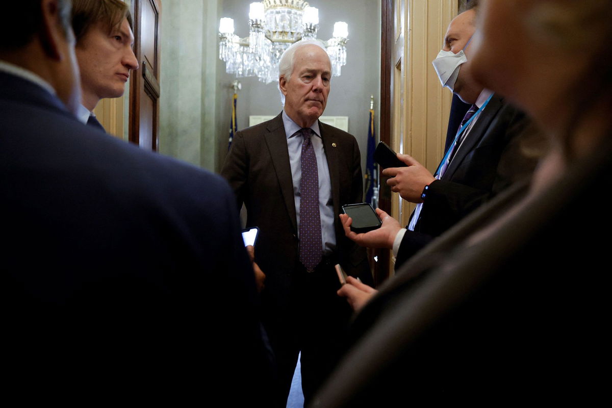 <i>Jonathan Ernst/Reuters via CNN Newsource</i><br/>U.S. Senator John Cornyn (R-TX) talks with reporters at the U.S. Capitol in Washington