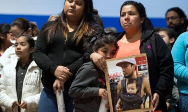 Community members gather at a prayer vigil at an elementary school in Morristown