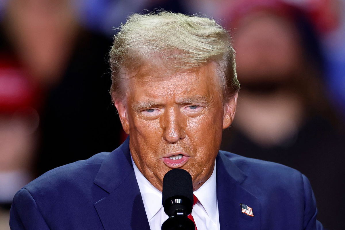 <i>Kamil Krzaczynski/AFP/Getty Images via CNN Newsource</i><br/>Donald Trump speaks during a campaign rally in Grand Rapids