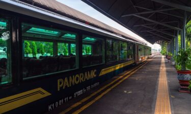 The Argo Wilis Panoramic carriage sits idle in Surabaya Gubeng Station.