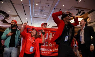 Trump supporters cheer election results in Las Vegas.