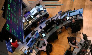 Traders work on the floor of the New York Stock Exchange on Tuesday