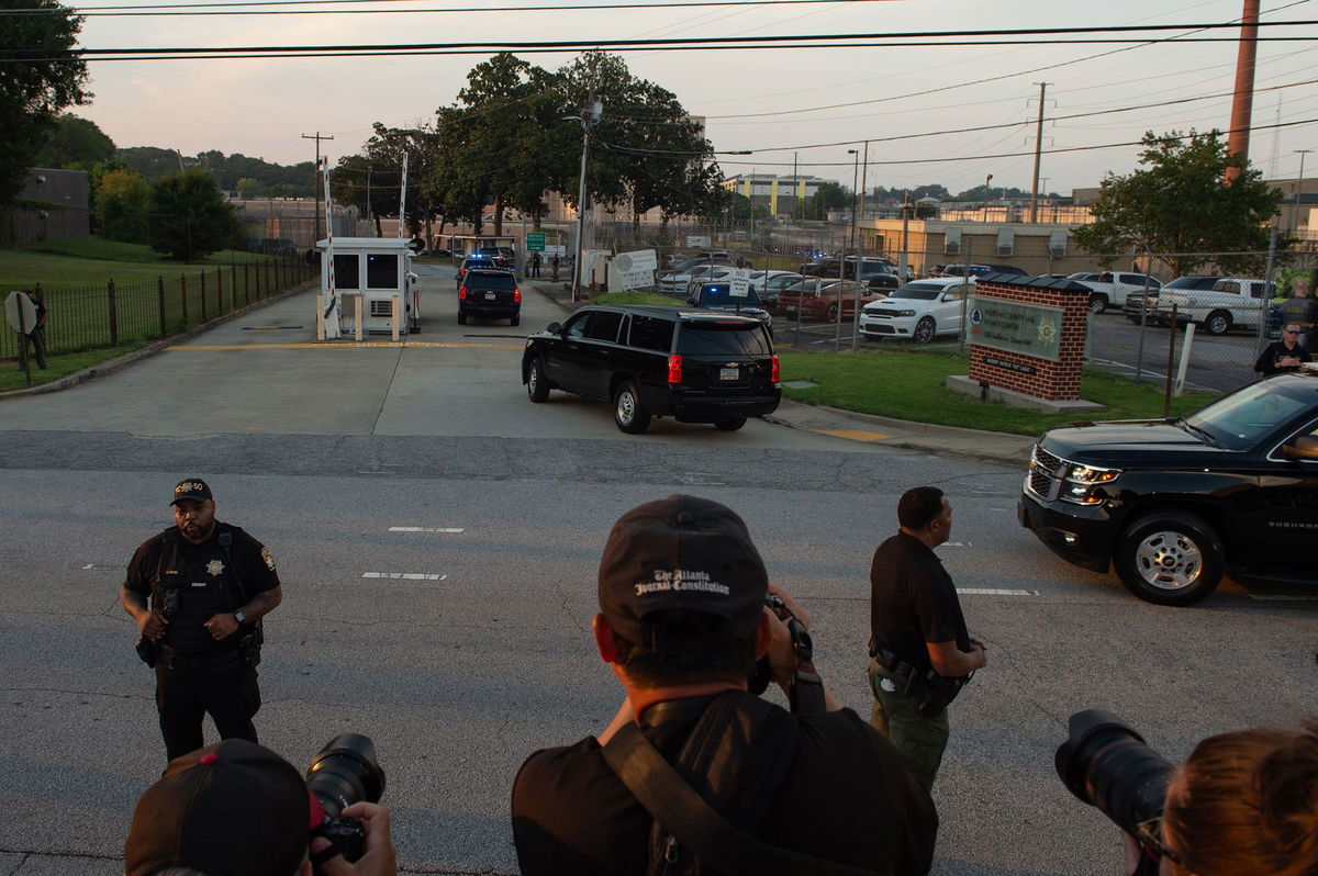 <i>Will Lanzoni/CNN via CNN Newsource</i><br/>Trump's motorcade arrives at the Fulton County jail in Atlanta