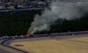 An image taken from aerial video shows smoke rising from a deadly plane crash Tuesday