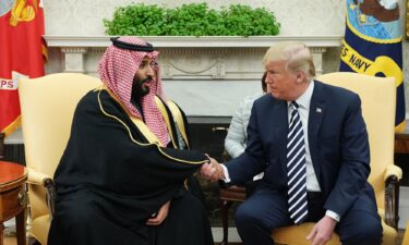 Trump shakes hands with Saudi Arabia's Crown Prince Mohammed bin Salman in the Oval Office of the White House in March 2018.