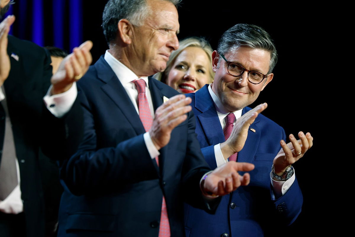 <i>Chip Somodevilla/Getty Images via CNN Newsource</i><br/>Speaker of the House Mike Johnson applauds on stage as Republican presidential nominee