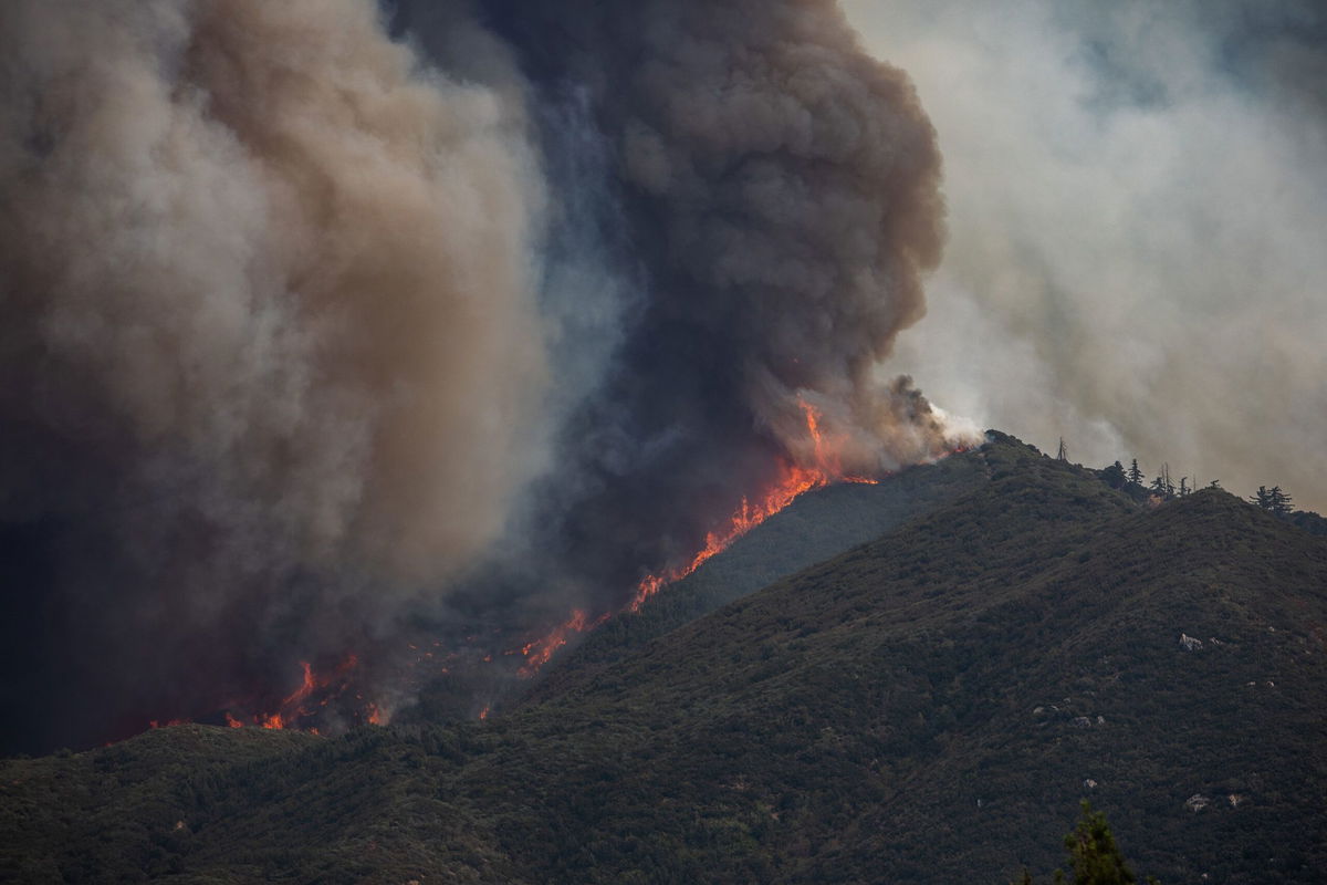 <i>Apu Gomes/Getty Images via CNN Newsource</i><br/>The Line Fire burned through the foothills of the San Bernardino Mountains in California