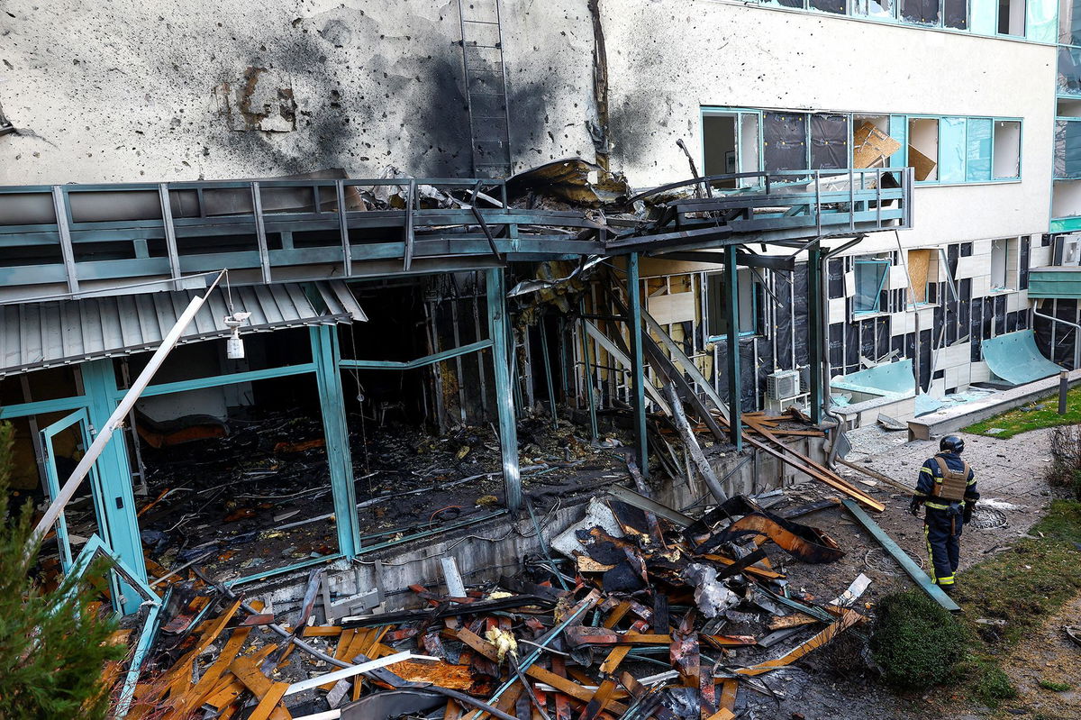 <i>Valentyn Ogirenko/Reuters via CNN Newsource</i><br/>A firefighter responds to damage at a medical center after a Russian drone strike on Kyiv