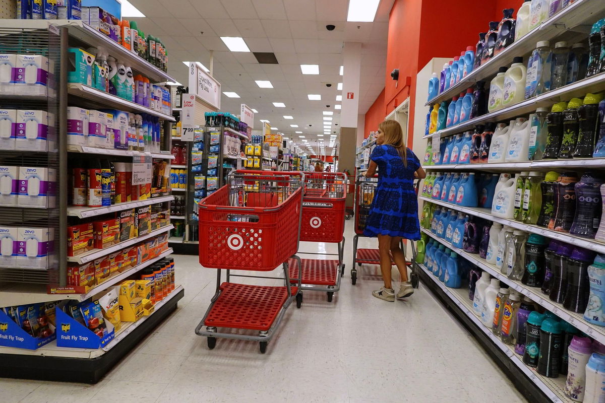 <i>Joe Raedle/Getty Images via CNN Newsource</i><br/>A customer shops at a Target store on May 20 in Miami