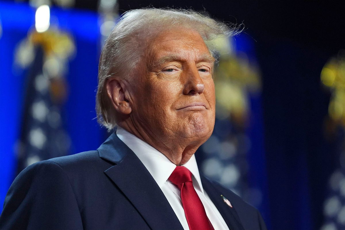 <i>Evan Vucci/AP via CNN Newsource</i><br/>Republican presidential nominee former President Donald Trump arrives at an election night watch party at the Palm Beach Convention Center