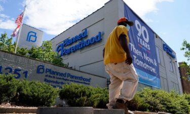 A person walks past Planned Parenthood in in St. Louis