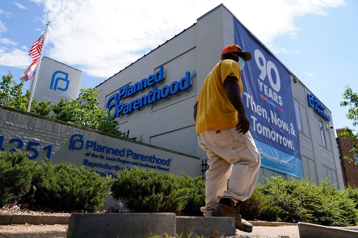 <i>Jeff Roberson/AP/File via CNN Newsource</i><br/>A person walks past Planned Parenthood in in St. Louis