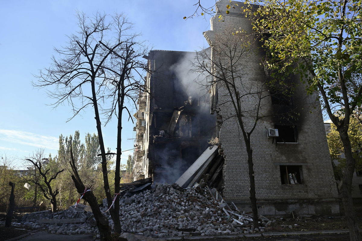 <i>Genya Savilov/AFP/Getty Images via CNN Newsource</i><br/>Smoke rises from the debris of a residential building in the town of Lyman