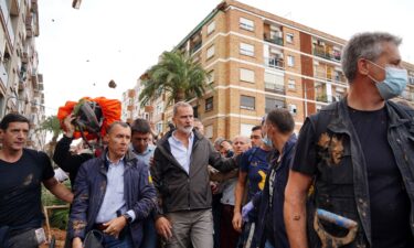 King Felipe is heckled by angry residents during his visit to the Valencia region on Sunday.