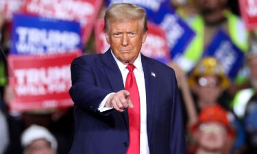 Former President Donald Trump gestures during a campaign rally in Pittsburgh